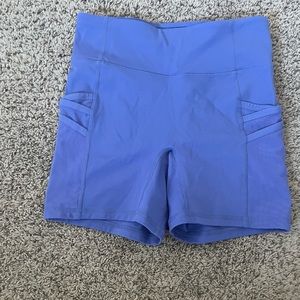 purple fabletics shorts with pockets